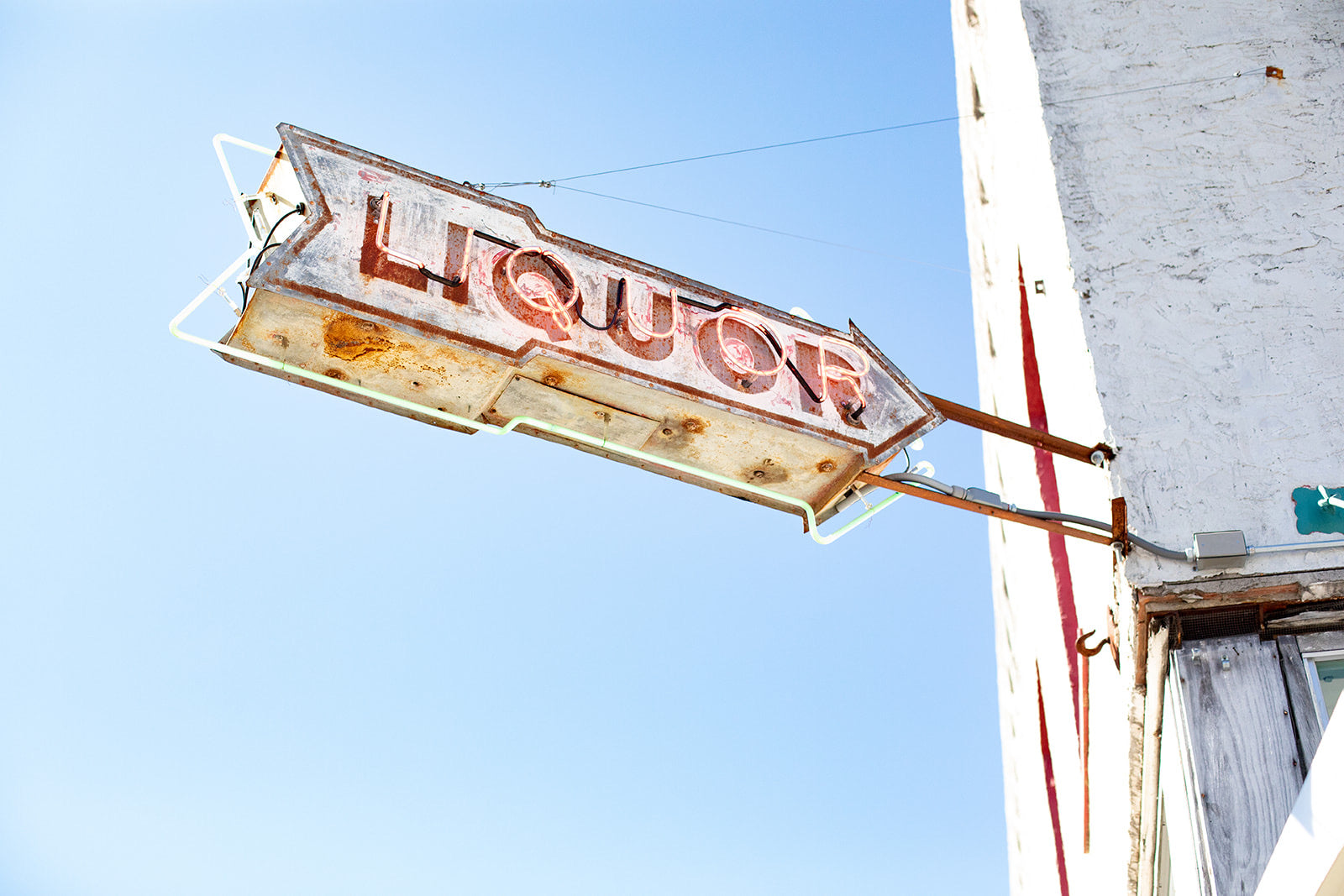 The LIQUOR sign outside 1844